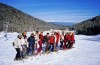 Il team in fila sulla neve.jpg